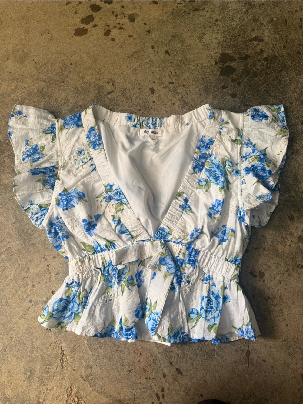 Day + Moon White Floral V-Neck Ruffle Crop Top in Blue